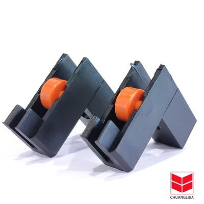 Custom L hình dạng nhôm cửa trượt kính đáy cuộn nylon bánh đơn cho thương mại
